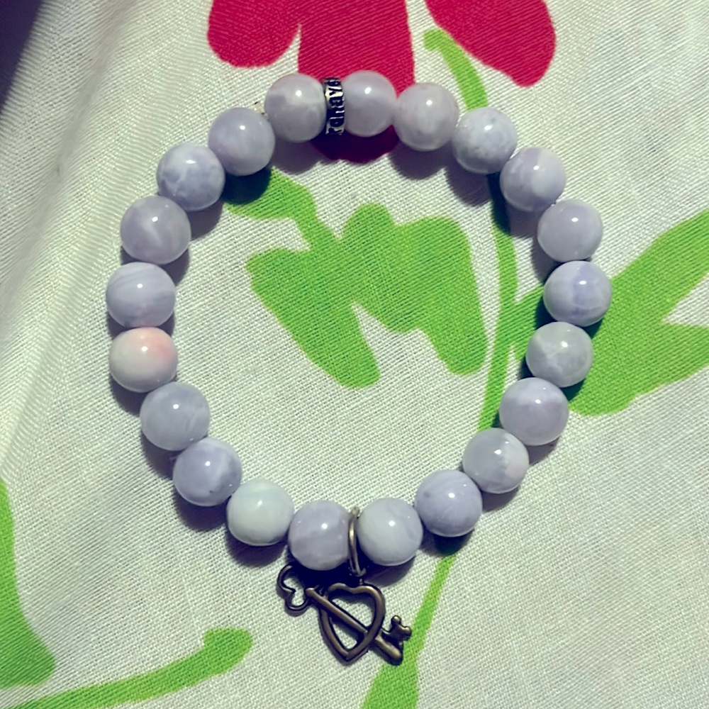 Kunzite crystal bracelet. means (romance, love , expression for happiness)